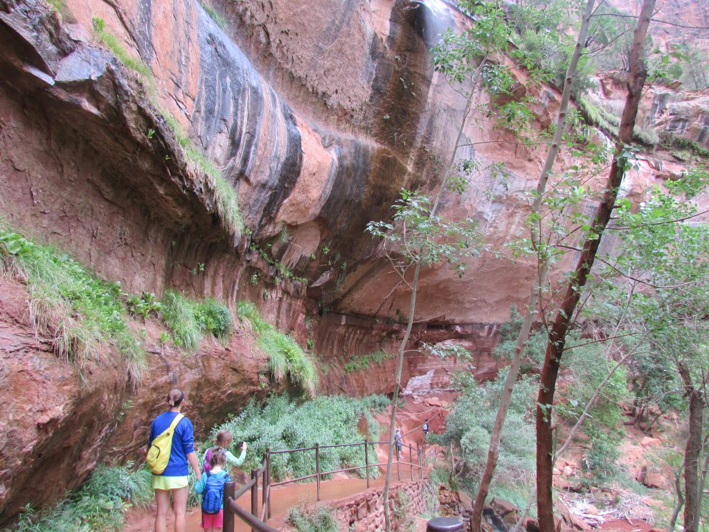 Mother and children hiking the Emerald Pool trail in Zion National Park